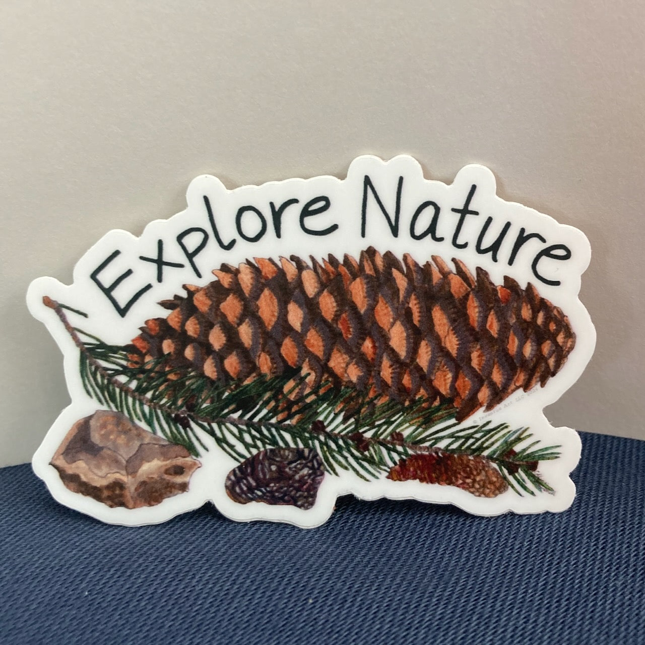 "Explore Nature" Pinecones and Rocks Vinyl Sticker (3″ × 2.02″)