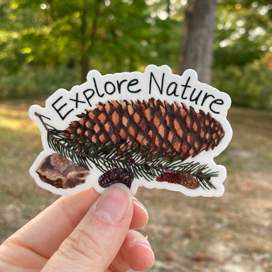 "Explore Nature" Pinecones and Rocks Vinyl Sticker (3″ × 2.02″)